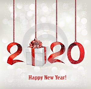 2020 New Years background with gift box and red ribbons.