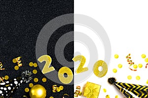 2020 numbers decorated with gold sequins, stars, ribbon, hat cap, gift box, ball on shiny black and white background.