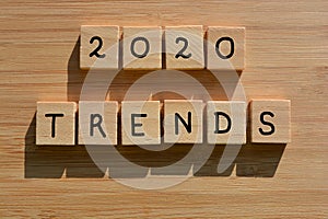 2020 Trends, words in 3d wooden alphabet letters on a wood background