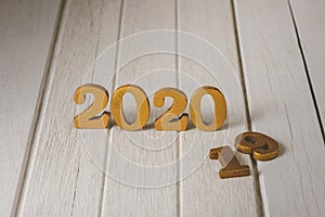 2020 Wooden gold number.  Happy New Year on nature concept
