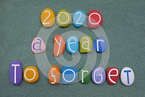 2020, a year to forget, creative logo composed with multi colored stone numbers and letters