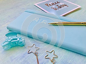 2021 Aqua Blue Diary, Pen, Christmas Card, Aqua Blue Hairpin, Golden J.ewelry, on Teal Background