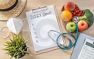 2021 New Year Goals in new normal lifestyle  work-life balance with face mask safety from covid-19  healthy food