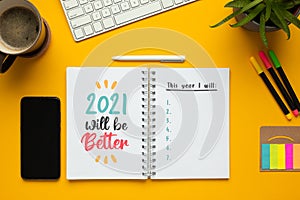 2021 new year notebook with list of goals and motivational phrase