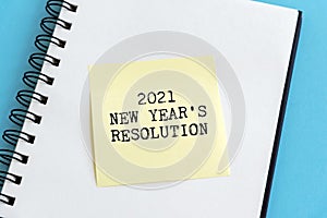 2021 New Year`s resolution text on sticky note