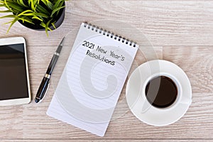 2021 New Year`s Resolutions text on note pad