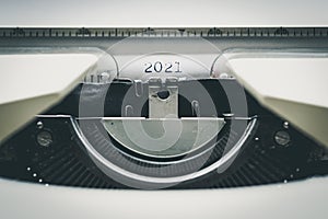 `2021` on vintage typewriter header. close up