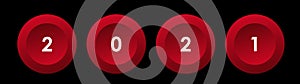 2021 white numbers new year on round red buttons on a black background