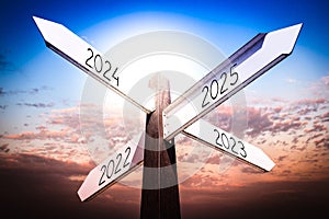 2022, 2023, 2024, 2025 concept - signpost with four arrows