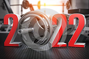 2022 Happy New Year  in fitness bodybuilding workout gym. Number 2022 with barbell and oter spoirt equipment