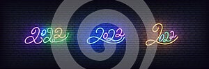 2022 lettering neon. Set of colorful signs for New Year 2022