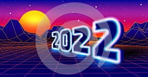 2022 neon sign for 80s styled retro New Years Eve celebration with arcade game grid landscape and yellow sun.