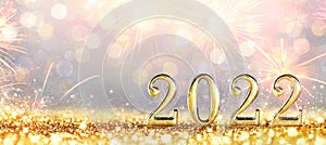 2022 New Year Celebration - Golden Numbers On Glitter