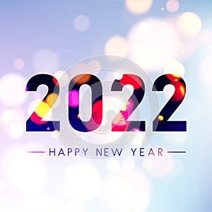 2022 sign on fogged blurred bubbles background