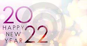 2022 sign on fogged blurred bubbles background