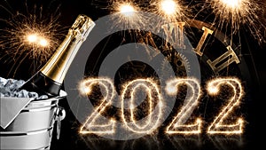 2022 sparkler number with clock and champagne bottle in cooler black. happy new year eve dark background