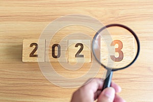 2023 block with magnifying glass. SEO, Search Engine Optimization, hiring , Advertising, Idea, Strategy, marketing, Keyword,