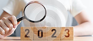 2023 block with magnifying glass. SEO, Search Engine Optimization, hiring , Advertising, Idea, Strategy, marketing, Keyword,