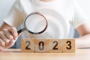 2023 block with magnifying glass. SEO, Search Engine Optimization, hiring , Advertising, Idea, Strategy, marketing, Keyword,