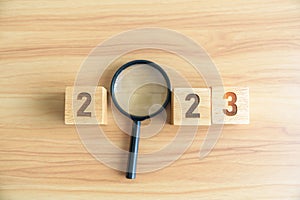 2023 block with magnifying glass. SEO, Search Engine Optimization, hiring , Advertising, Idea, Strategy, marketing, Keyword,