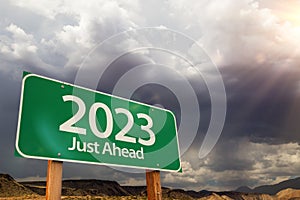 2023 Green Road Sign Over Dramatic Clouds and Sky