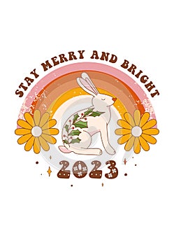 2023 is the year of the rabbit. Christmas retro greeting card with groovy rabbit, rainbow, flowers and holiday objects.