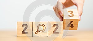 2024 block with magnifying glass icon. SEO, Search Engine Optimization, hiring , Advertising, Idea, Strategy, marketing, Keyword,