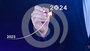 2024 Business Planning, Strategy, creative, Idea concept, Businessman pointing chart graph with 2024 business icon, new setting