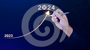 2024 Business Planning, Strategy, creative, Idea concept, Businessman pointing chart graph with 2024 business icon, new setting