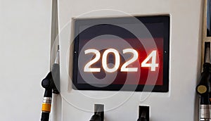 2024 on the display on the gas pump at the petrol station. Happy new years