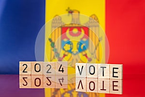 2024 elections in Moldova, Moldovan national colors and the inscription VOTE 2024. Concept of presidential elections in Moldova in