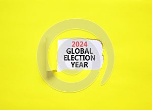 2024 global election year symbol. Concept words 2024 global election year on beautiful white paper. Beautiful yellow background.