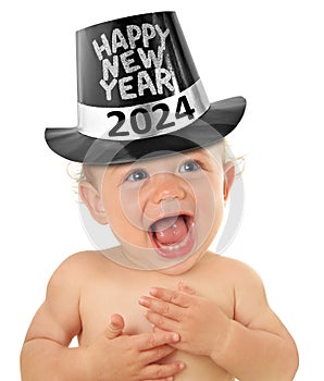 2024 Happy new year baby wearing a top hat. Smiling toddler on New Years eve.
