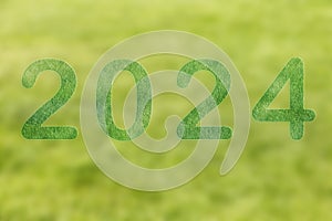 2024, Number 2024 on green background. Happy New Year