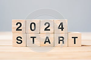 2024 START text on table. Resolution, strategy, goal, motivation, reboot, business and New Year holiday concepts