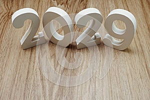 2029 Happy New Year with space copy on wooden background