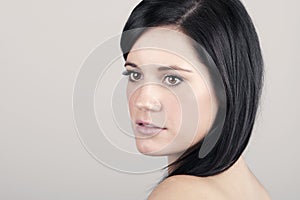 20s Woman on Grey Background