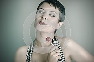 20s woman with lolly pop, pin up style