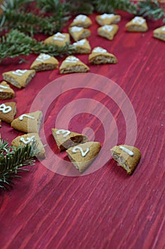 24 numbered advent cookies on red wood