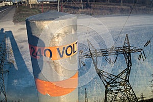 240 Volts pole & Pylon double exposure