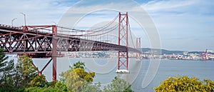 25 de Abril bridge, or Salazar bridge seen from Almada to Lisbon-Portugal.