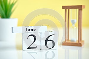 26 twenty sixth day june Month Calendar Concept on Wooden Blocks