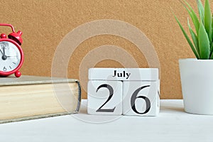 26th july - twenty sixth day month calendar concept on wooden blocks