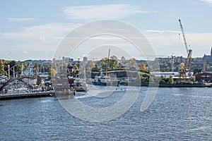 27.09.2021 Sweden Stockholm View of coast guard harbour beside amusement park Grona Lund on Djurgarden island