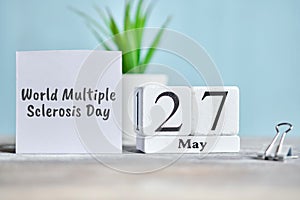 27 twenty seventh World Multiple Sclerosis day May Month Calendar Concept on Wooden Blocks