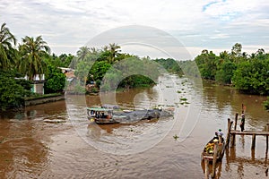 28 DECEMBER 2016, Vietnam, Tan Tru.Boat on the mekong river in south vietnam near vinh long on a sunny summer day