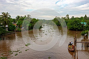 28 DECEMBER 2016, Vietnam, Tan Tru.Boat on the mekong river in south vietnam near vinh long on a sunny summer day