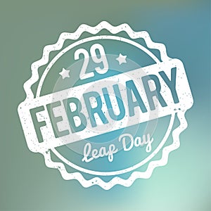 29 February Leap Day rubber stamp white on a blue bokeh fog background.