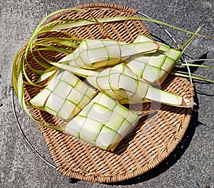 29. Ketupat Shells from Young Coconut Leaves on a Wicker Rattan Plate (29)