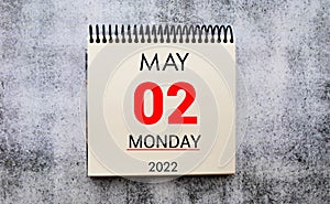 2nd day of May. Travel planning, vacation trip - Calendar with the date 2 May glasses notepad
